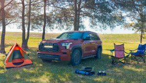 2024 Toyota Sequoia TRD Pro in the woods camping.